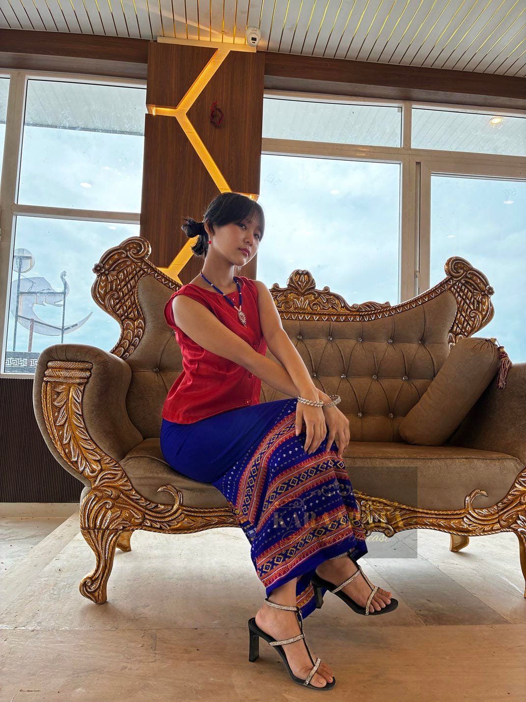Red sleeveless blouse